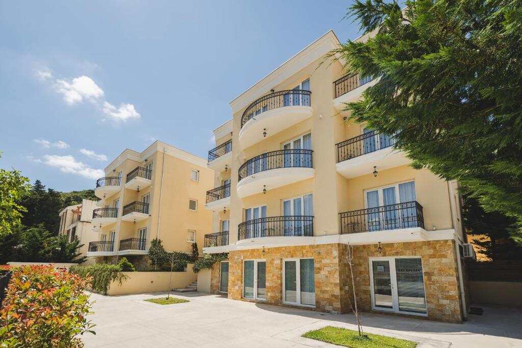 Villas Promis apartment building with balconies in Čanj, Montenegro