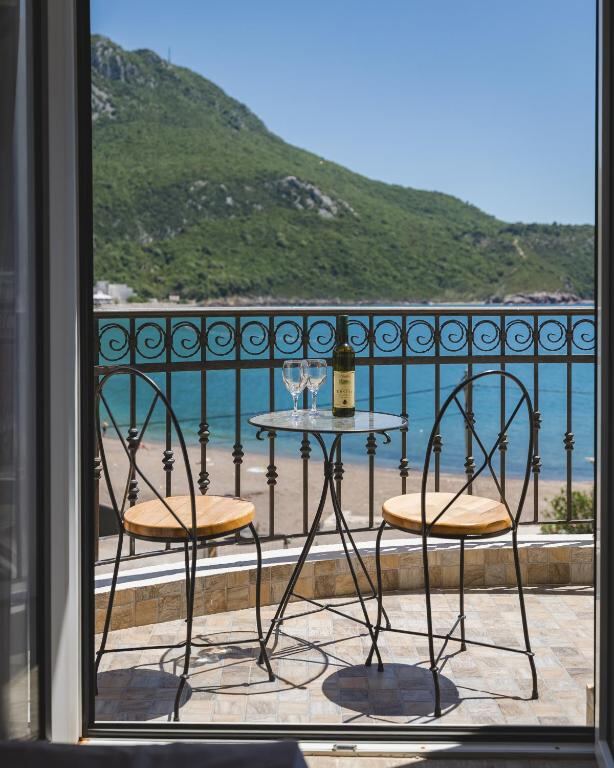 View from a Villas Promis balcony over Čanj beach and the Adriatic Sea